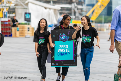 Youth volunteers raising awareness for zero waste